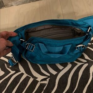 Stylish Blue Women's Bag. Athletica new never used, beautiful color hip bag
